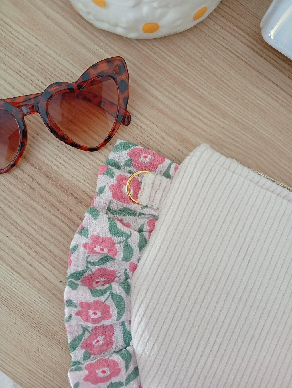 Mama Pochette Beige | Storia