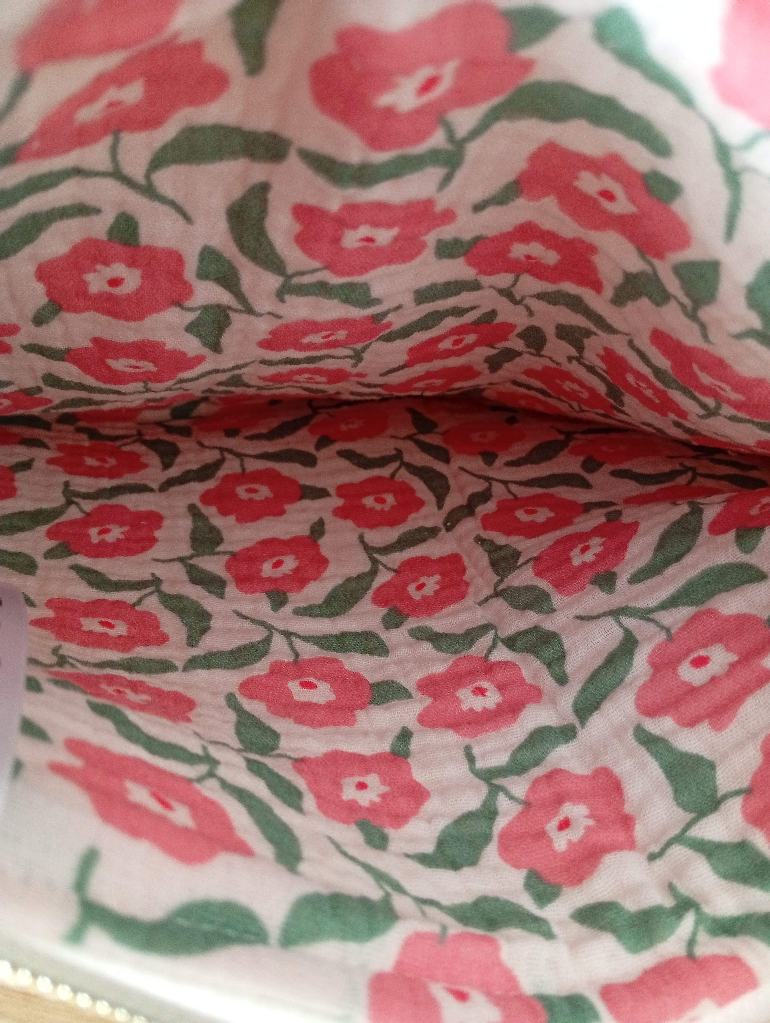 Mama Pochette Beige | Storia